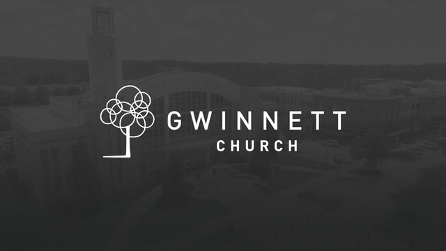 Gwinnett Church logo with city hall background