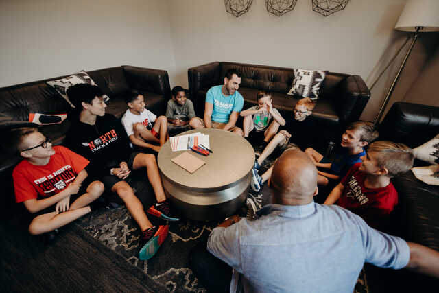 transit boys small group meeting with their leaders