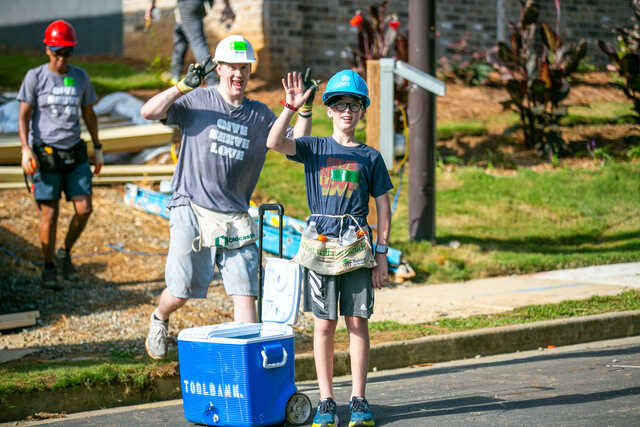 volunteers helping at a habitat for humanity build site