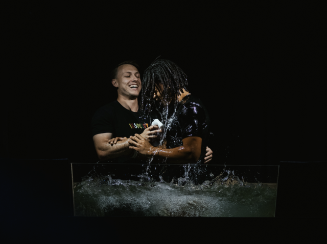 Student being baptized